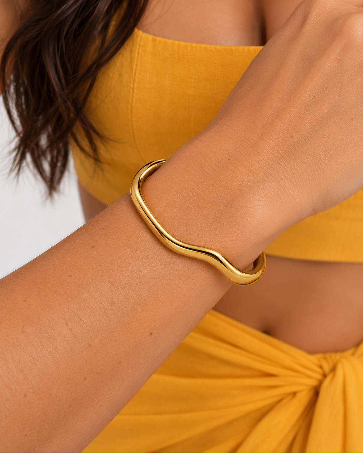 Naia Adjustable Solid Bangle — Gold wearing macro with marigold beach co-ord