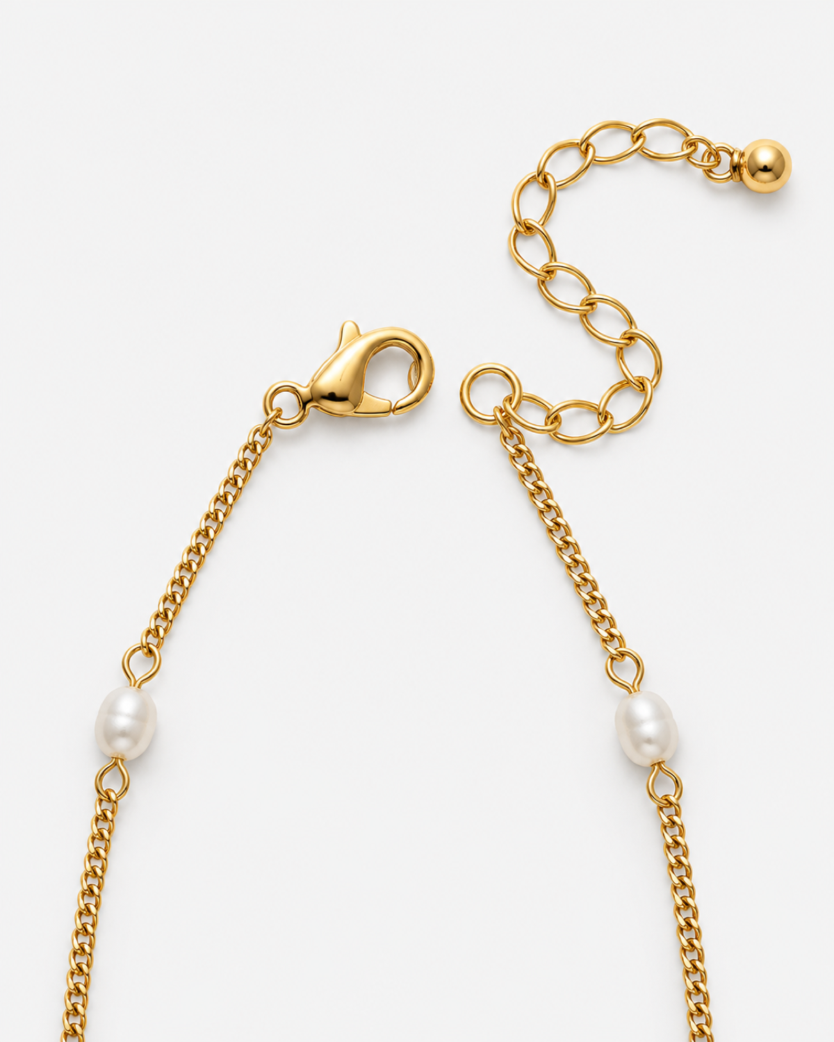 Coralie Dainty Pearl Choker in gold, lobster clasp and extender chain detail