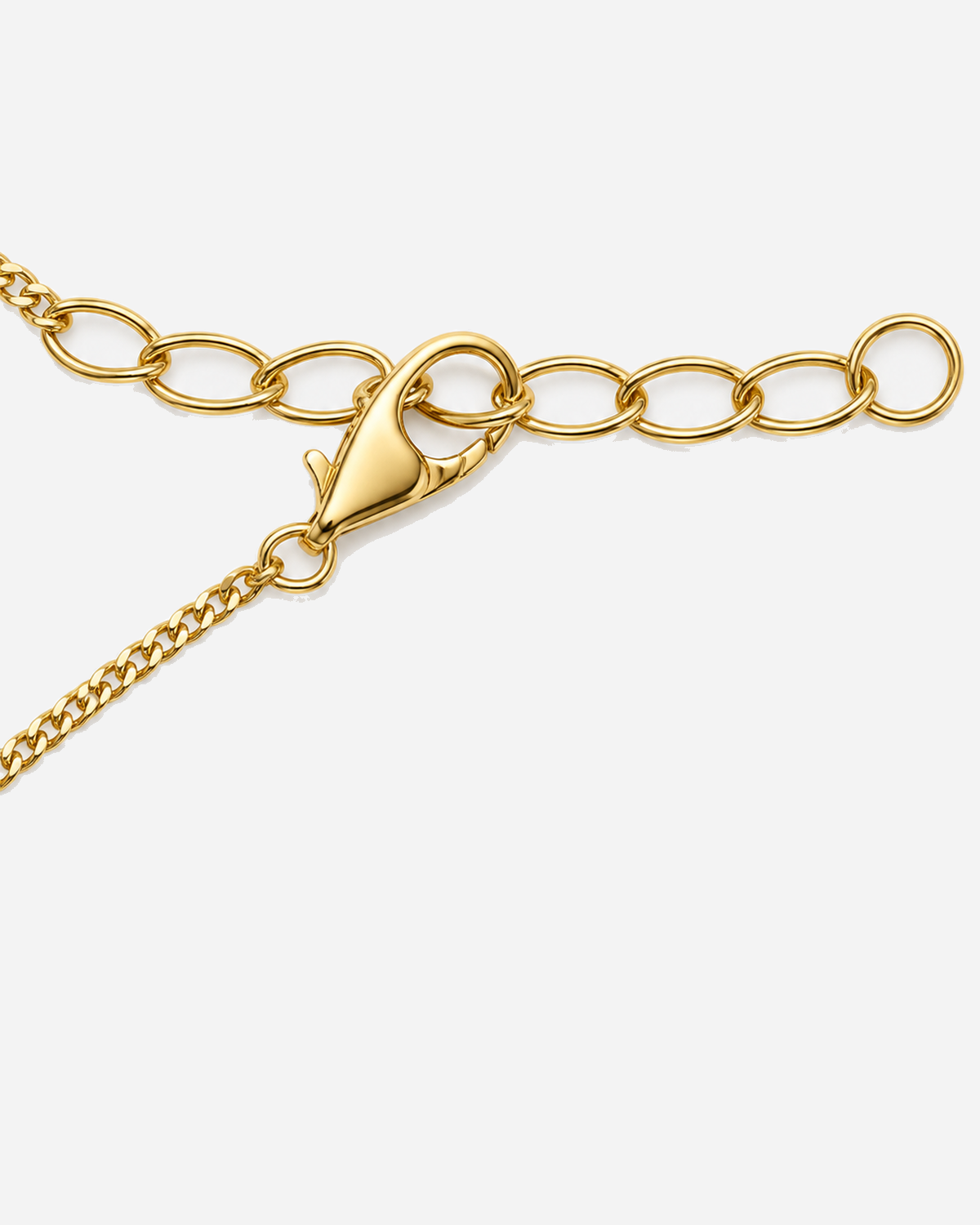 Xanthe Emerald Necklace in Gold, close-up of lobster clasp and extender chain