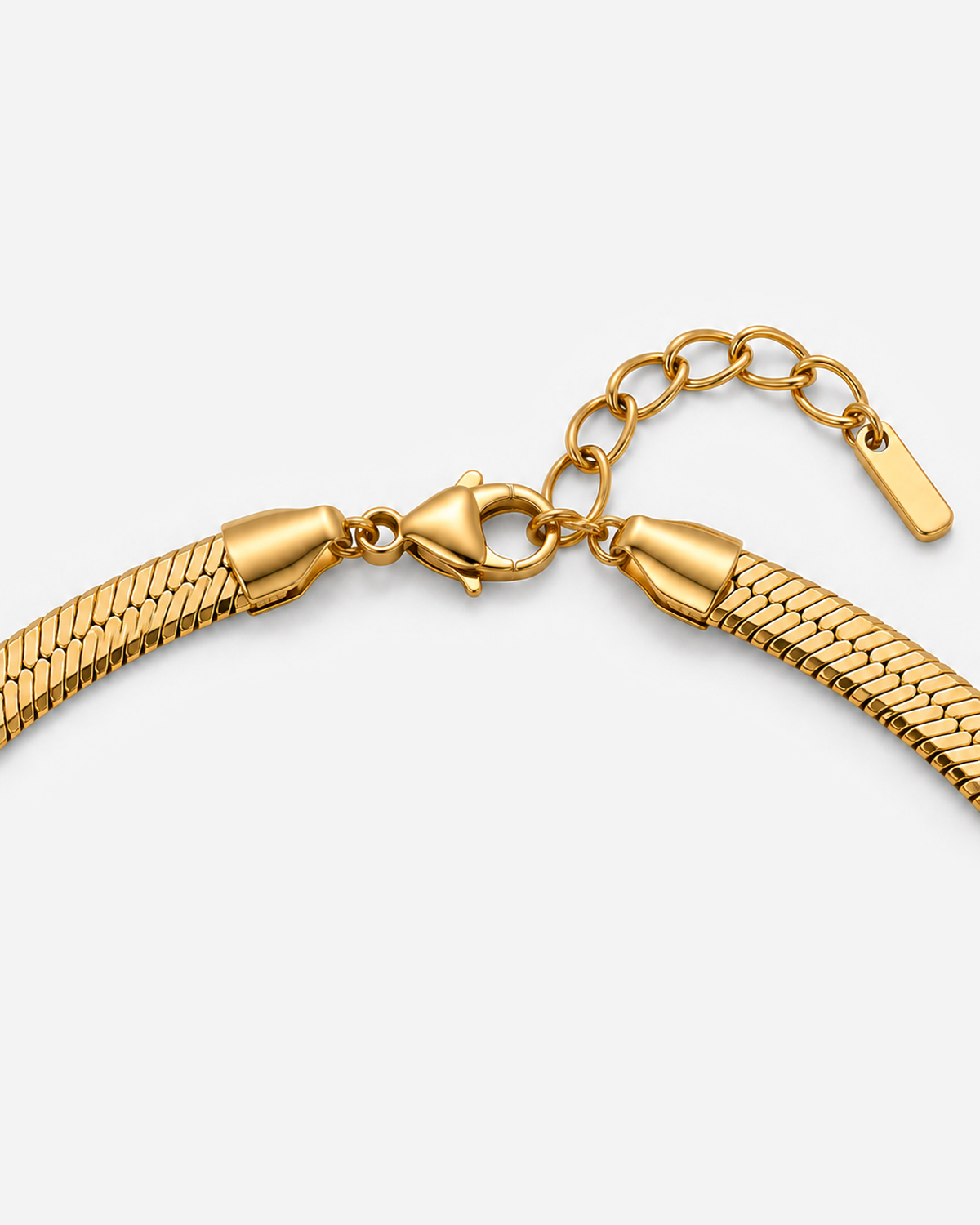 Gold lobster clasp and herringbone end-piece closure detail