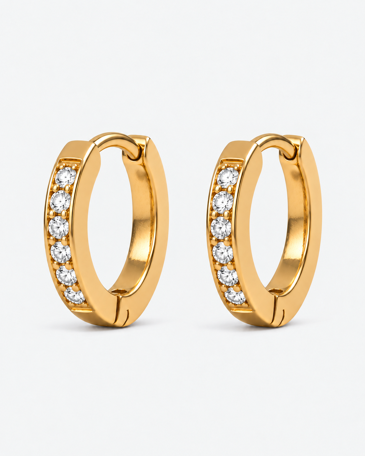 Vela Tiny Gold Hoop Earrings — Gold closed hinged closure detail
