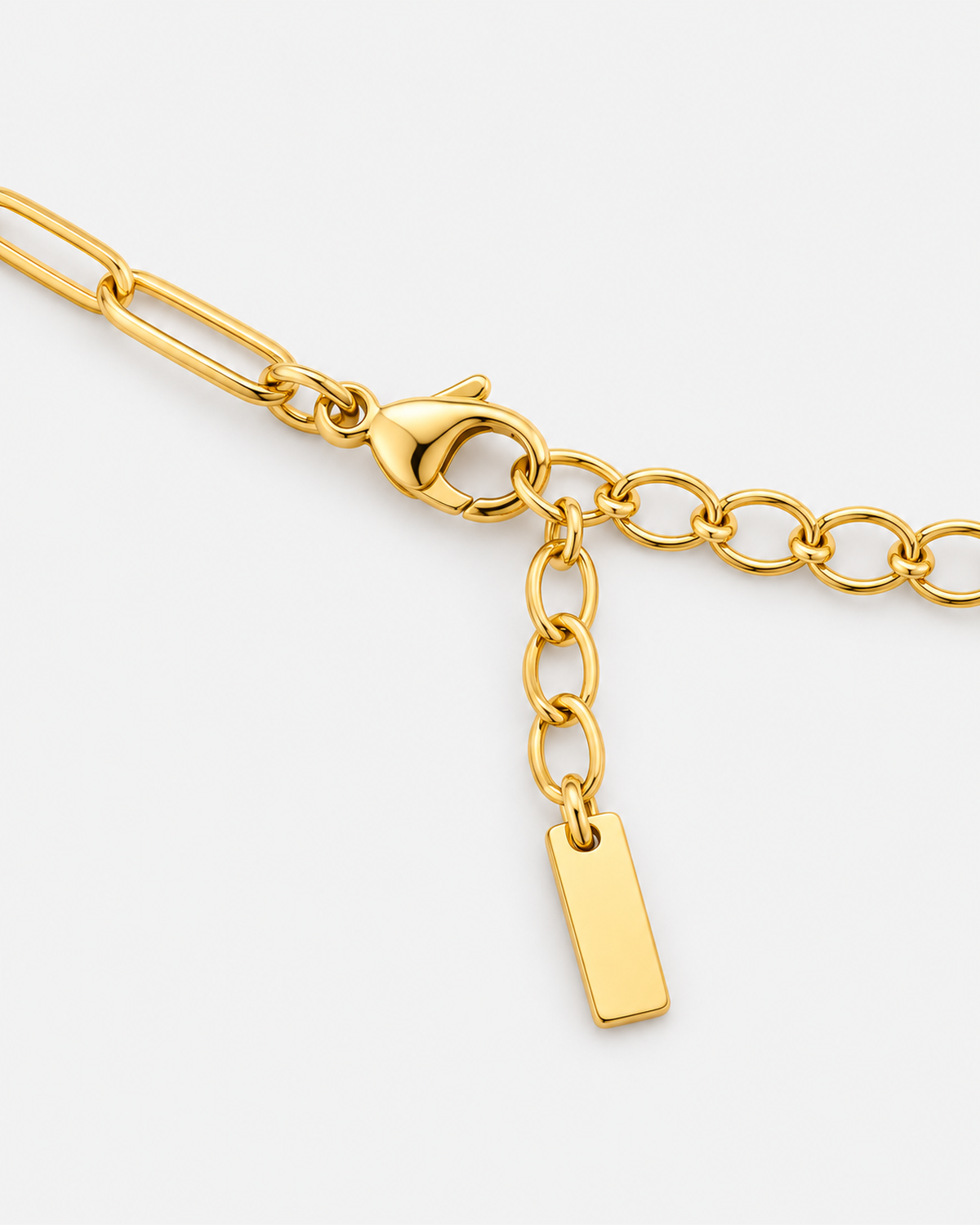 Lucienne Paperclip Bracelet — 27 — Gold — lobster clasp, oval extender and blank rectangular terminal macro