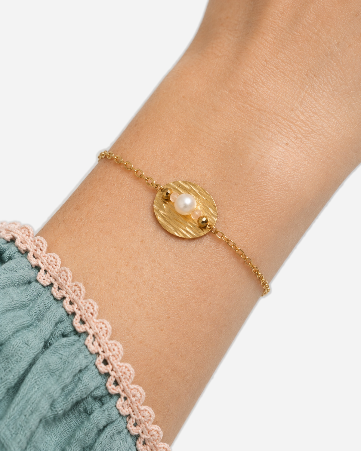 Rita Pearl Bracelet — Gold close-up wearing macro