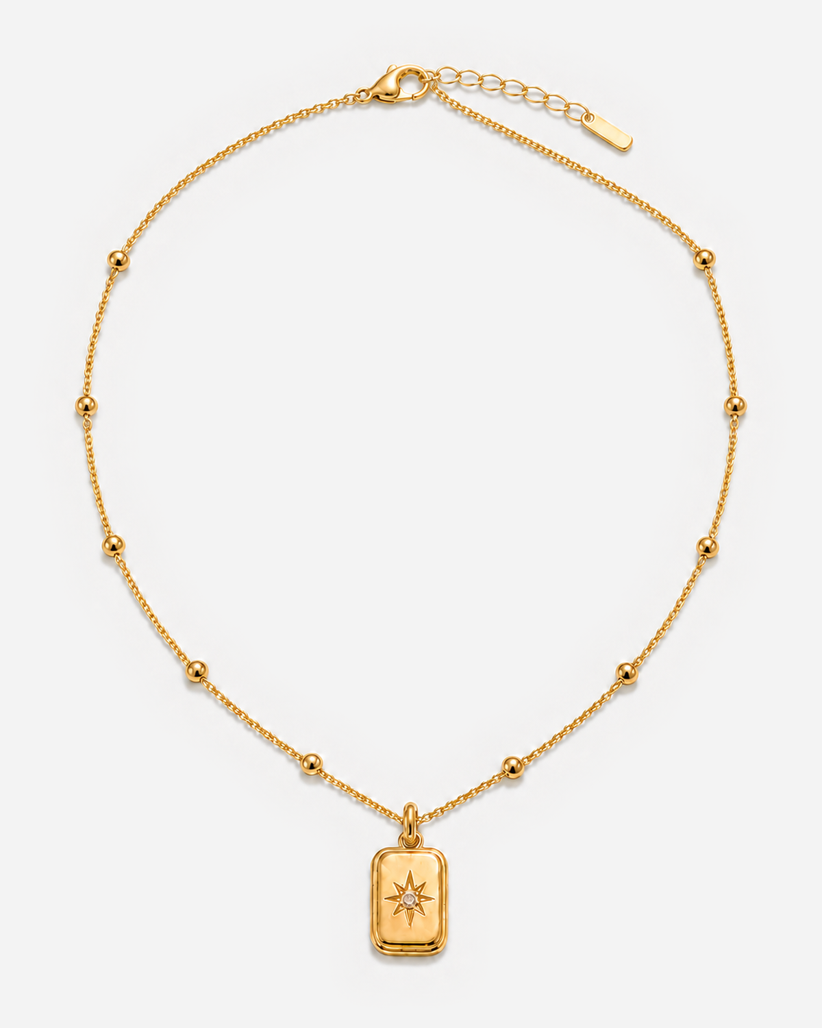 Gold-tone Camille Starlight Necklace with a rectangular star-motif pendant
