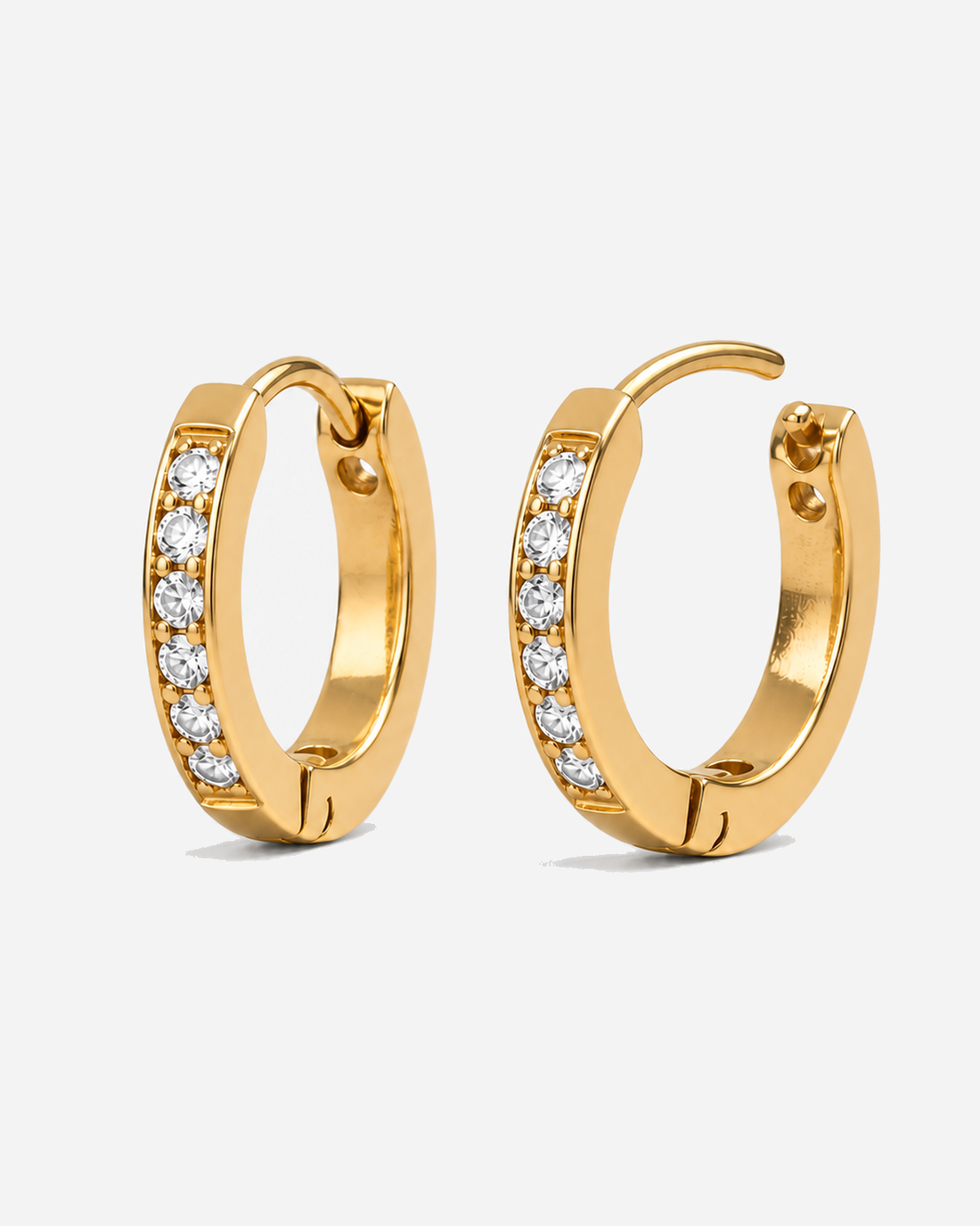 Vela gold-tone hoop earrings with clear round accents arranged along the front