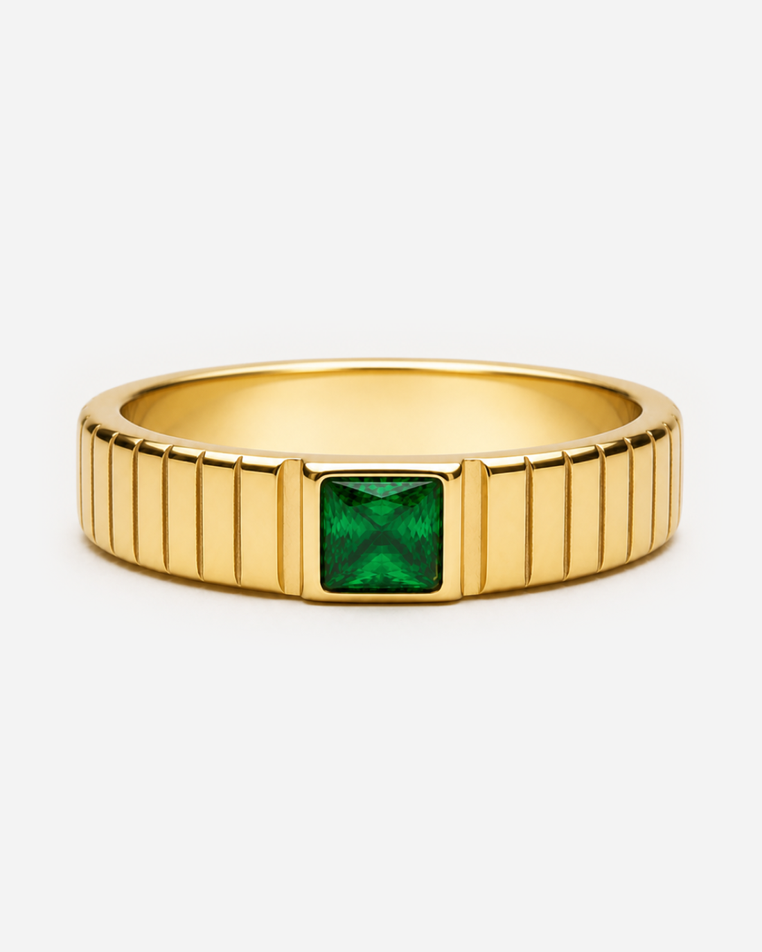 Gold-tone Iris ring with a rectangular green centre and fluted band