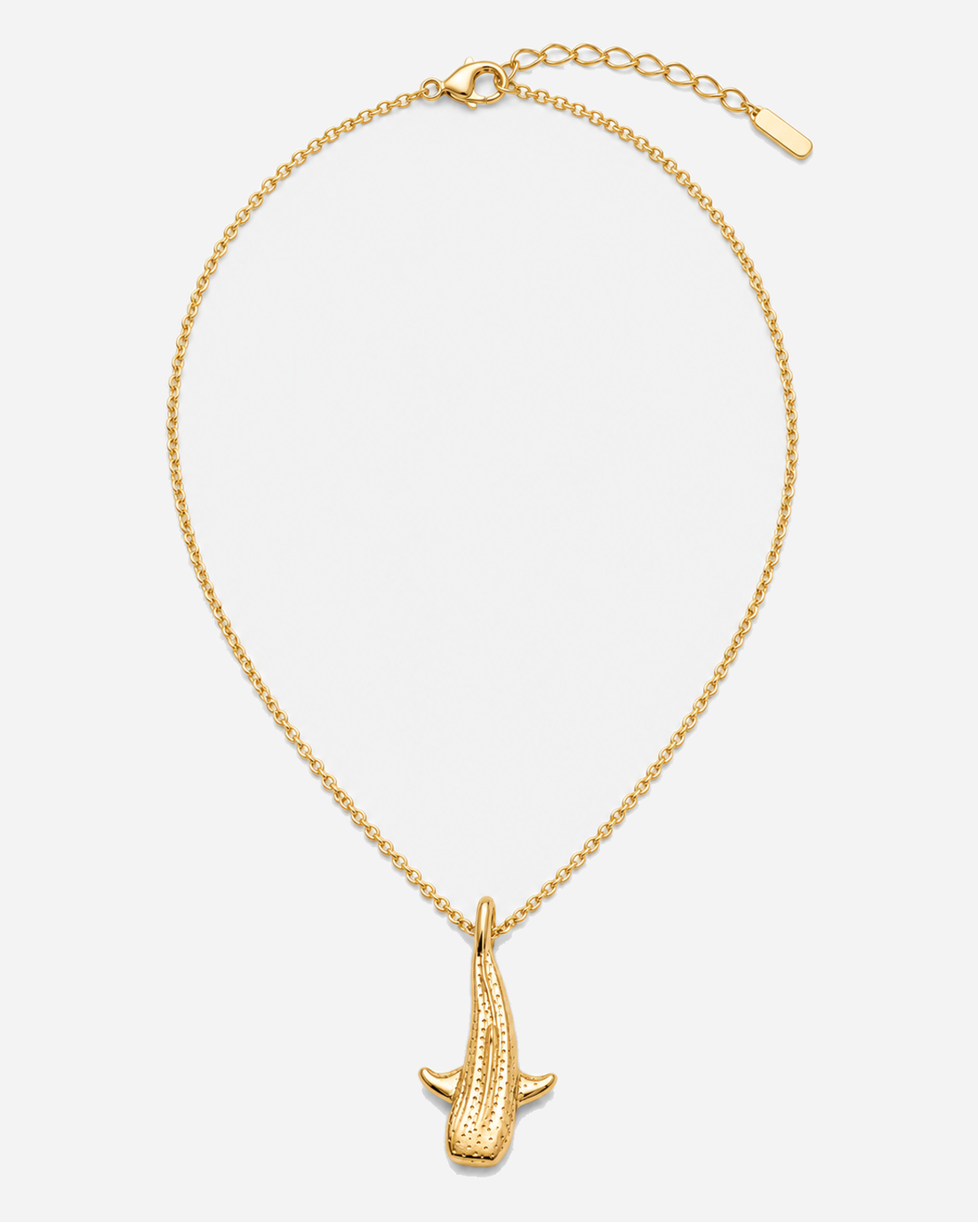 Gold-tone Zora whale-shark pendant necklace with its chain, clasp and extender