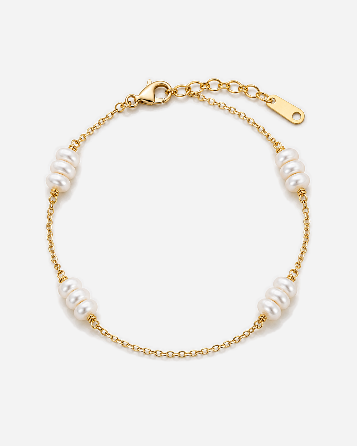 Sophia gold-tone bracelet with grouped white accents and visible chain links.