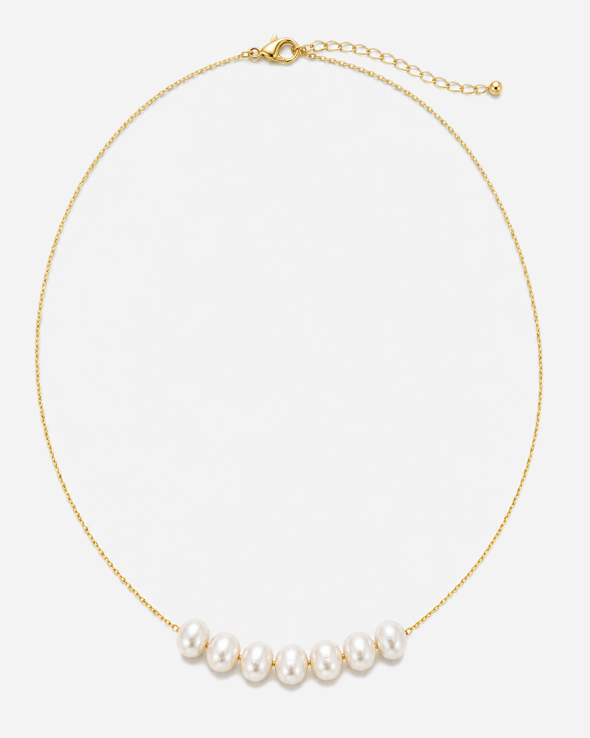 Margo gold-tone necklace with white oval accents arranged in a curved centre