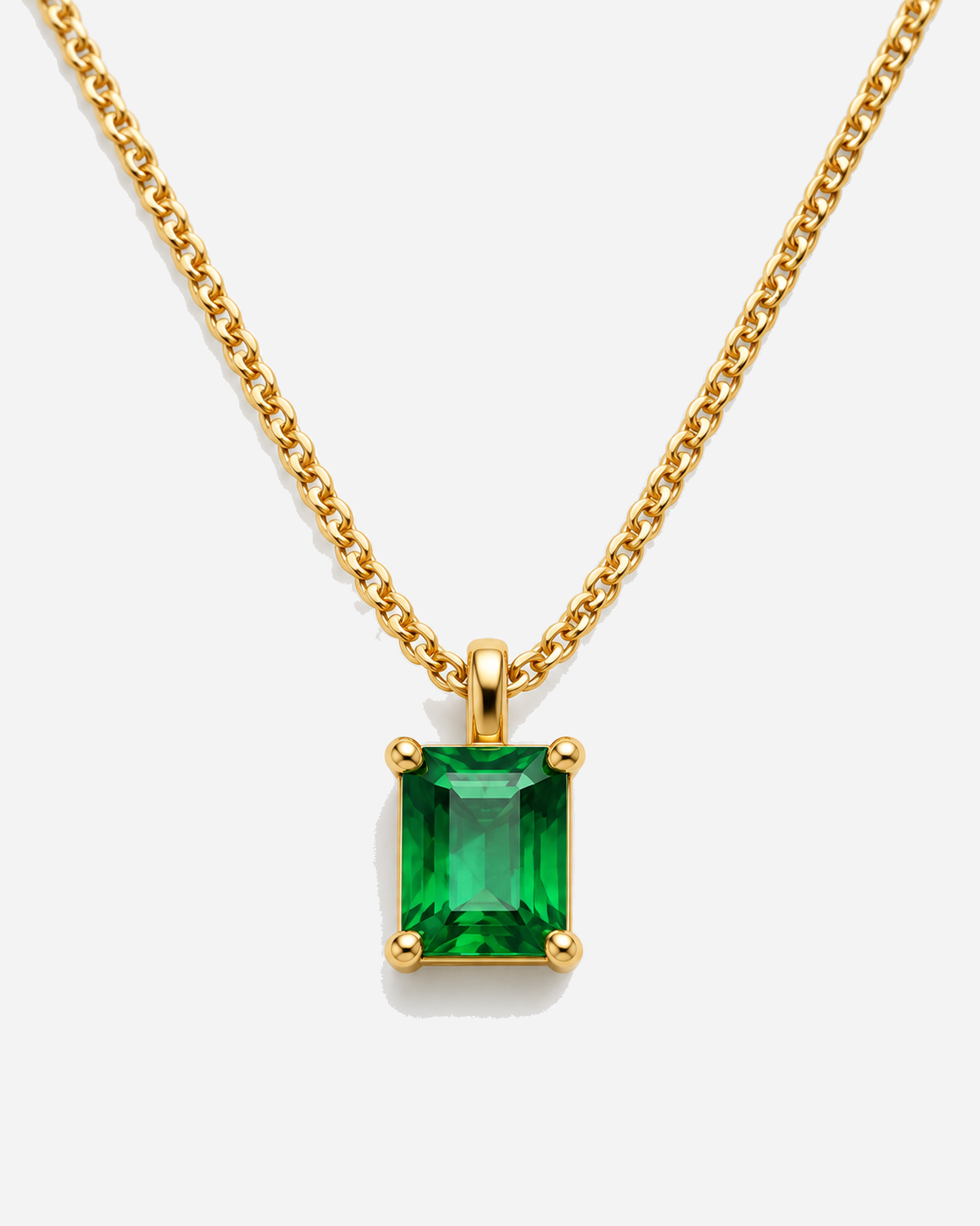 Xanthe necklace close-up showing the top loop above its green zirconia pendant