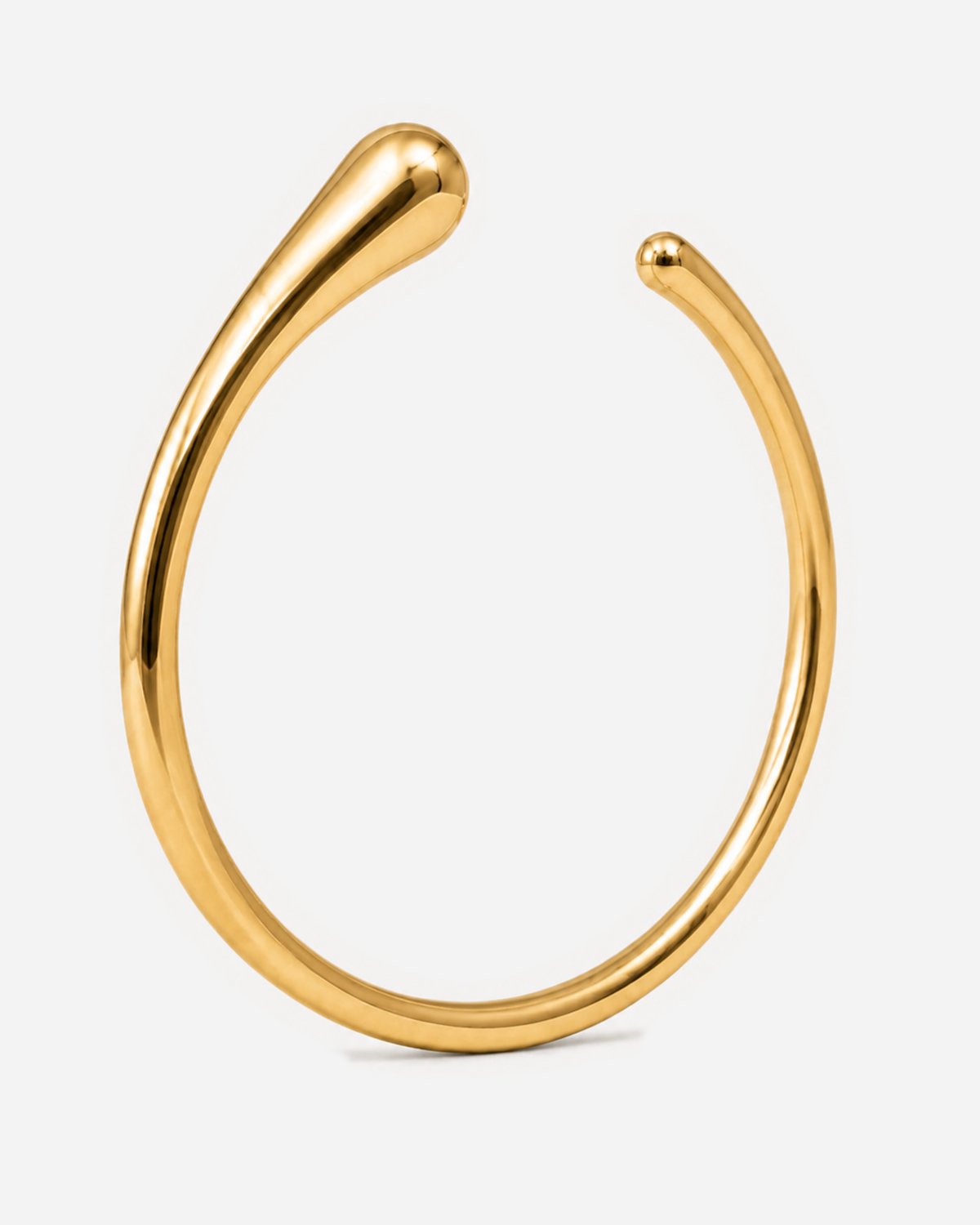 Janeva gold-tone open cuff with rounded ends