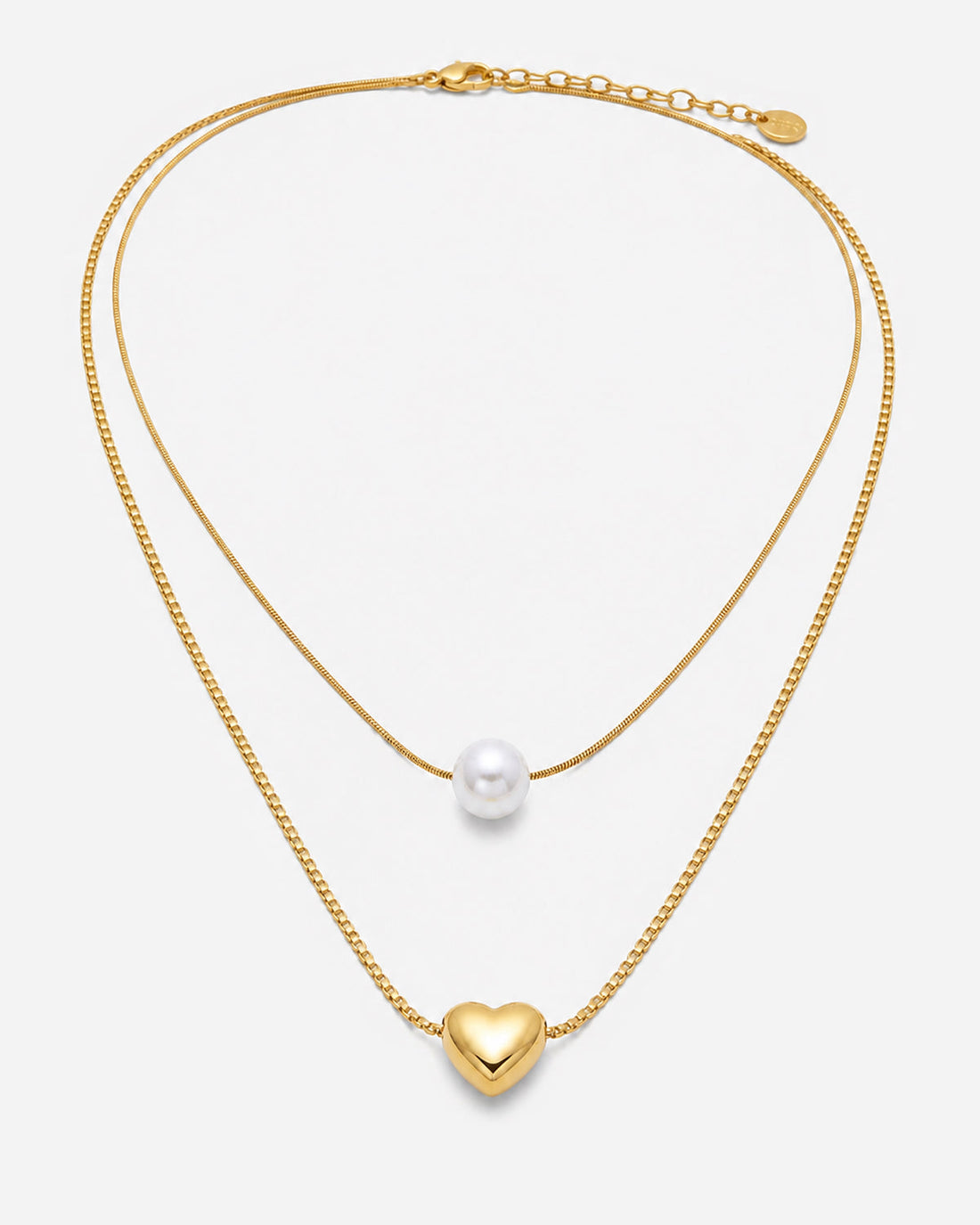 Gold-tone Maisy necklace with a polished heart pendant and white round accent on separate layers
