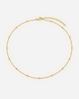 Delja Beaded Necklace — Gold — light grey product hero