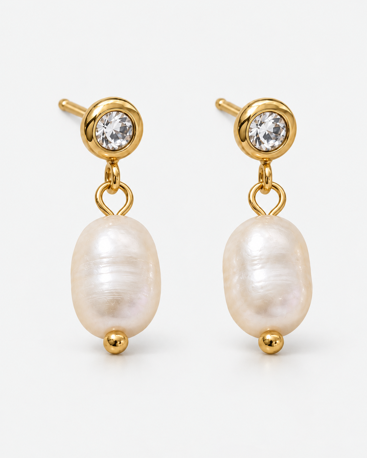 Marley gold-tone drop earrings with clear round tops, white oval drops and small round end beads