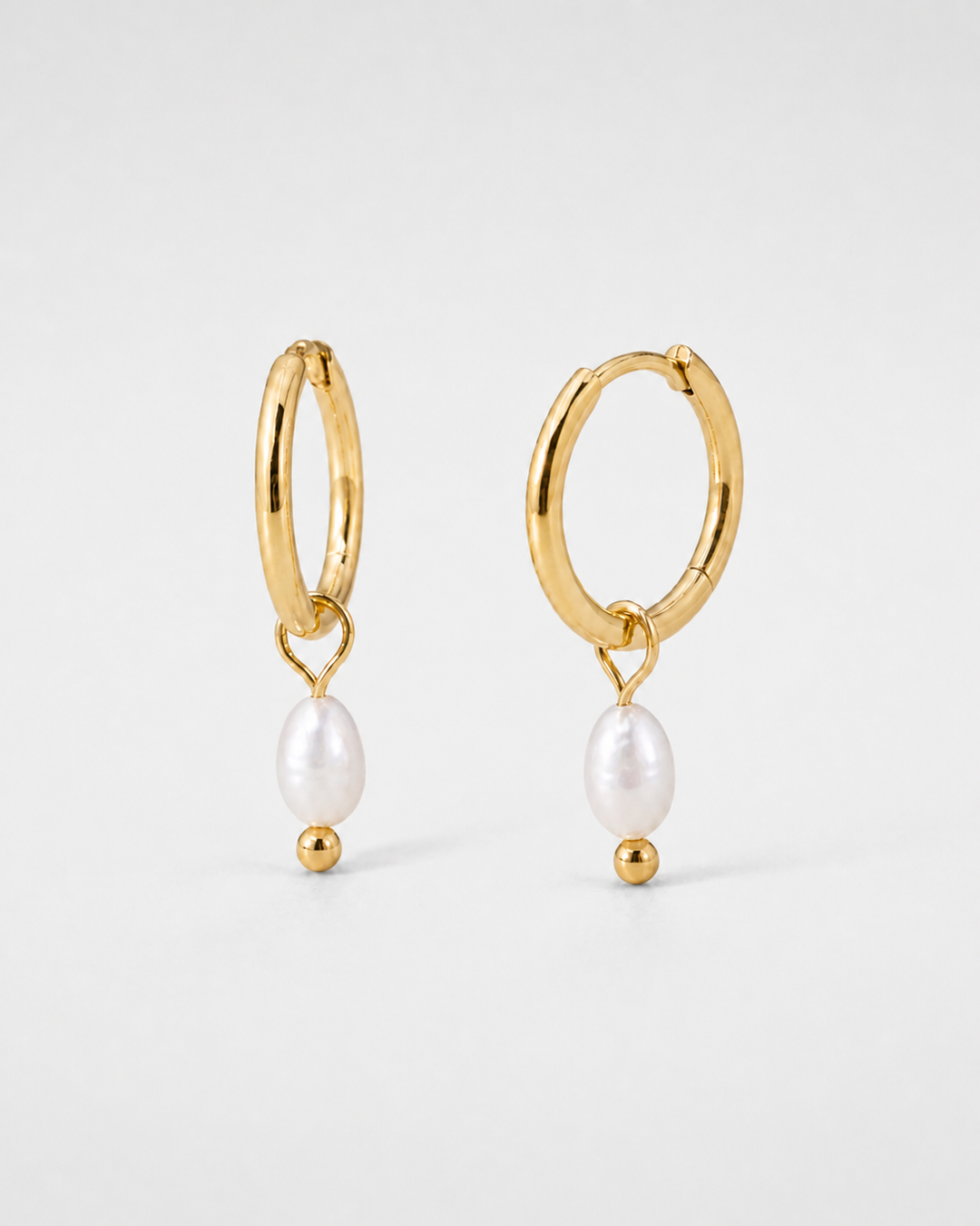 Jolie Pearl Huggie Hoops — light grey product hero