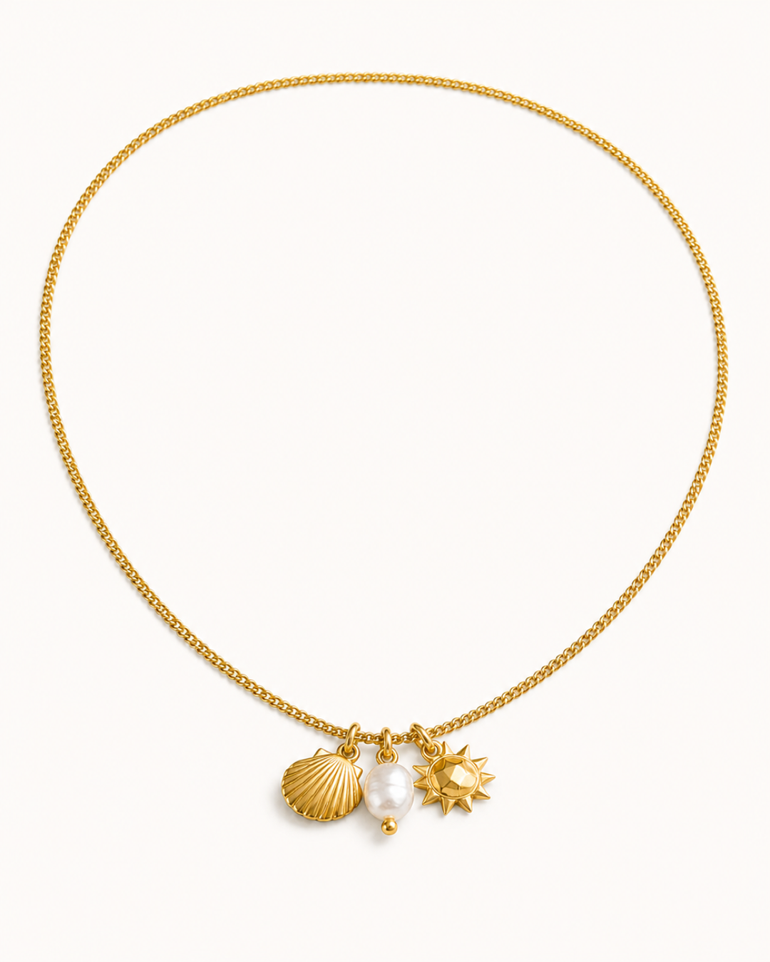 Kallia Ocean Necklace in gold with shell, pearl and sun charms