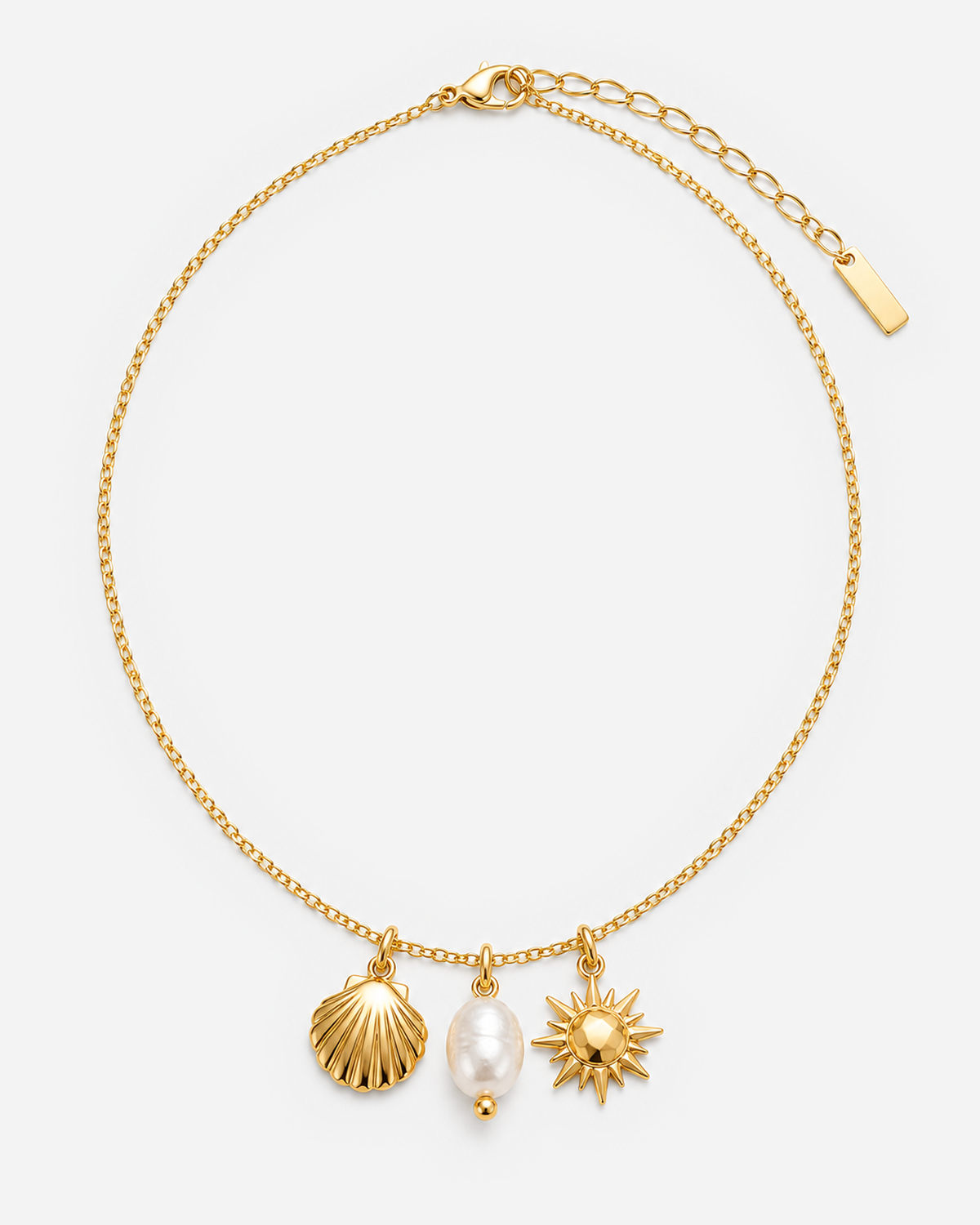 Kallia Ocean Necklace in gold with shell, pearl and sun charms