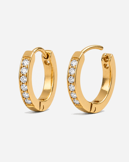 Vela Tiny Gold Hoop Earrings — light grey product hero