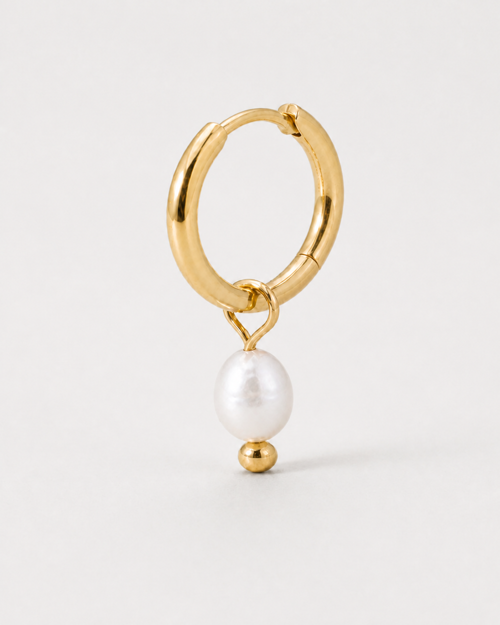 Jolie Pearl Huggie Hoops — product macro detail