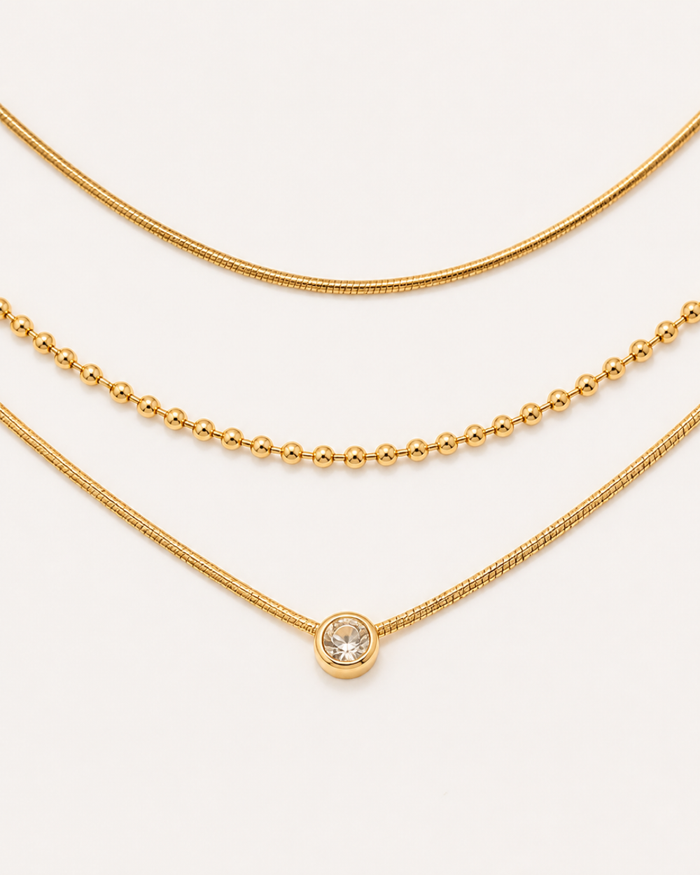 Alyrah Layered Crystal Necklace — sharp crystal and chain macro