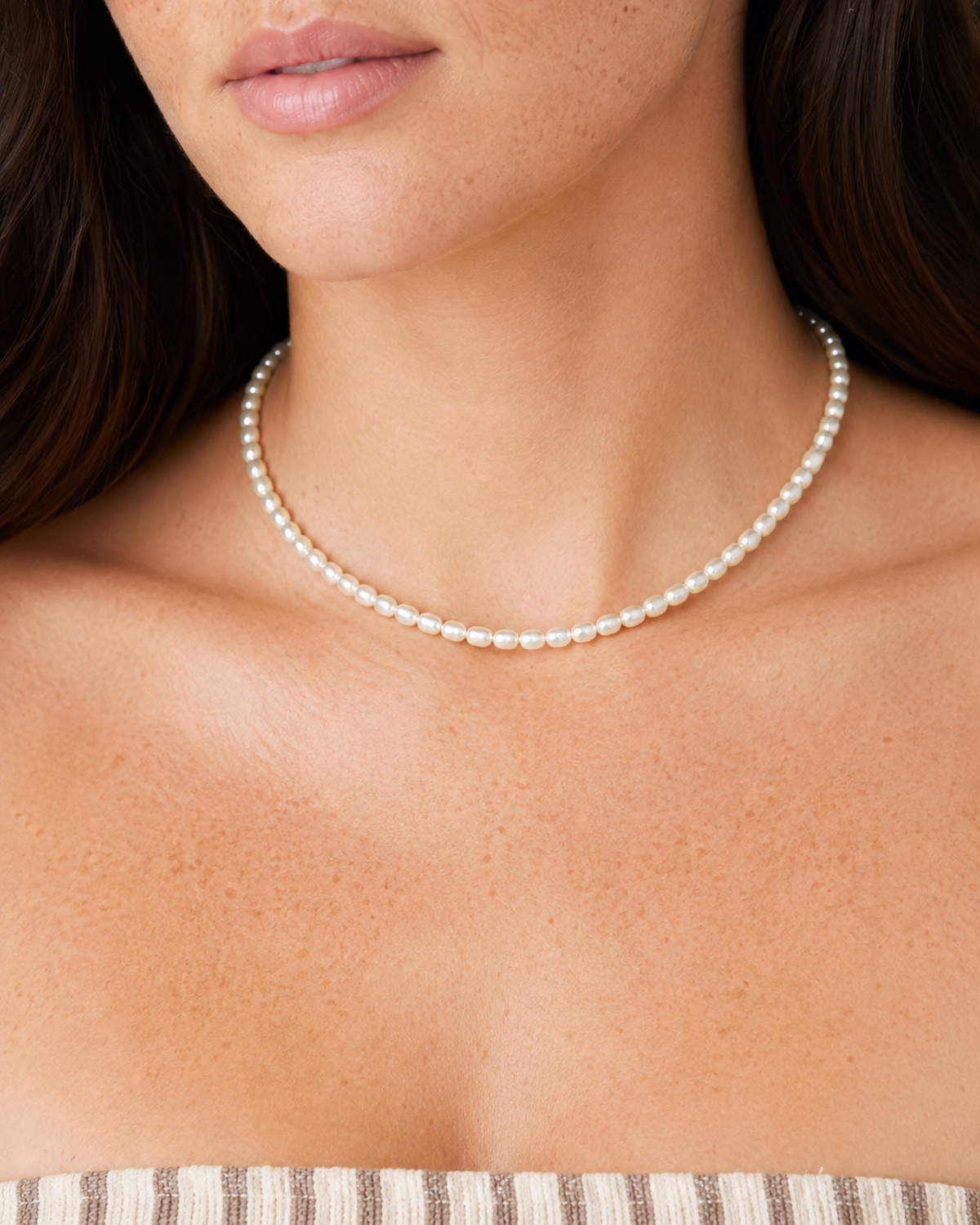Elara Freshwater Pearl Choker — 04 — Gold — dusty-plum/taupe outfit — front wearing view