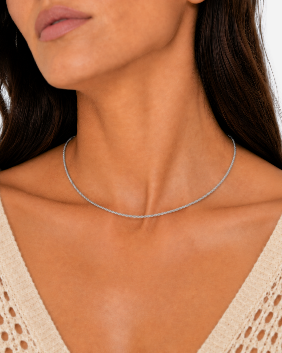Kaia silver-tone twisted rope chain shown across the collarbones