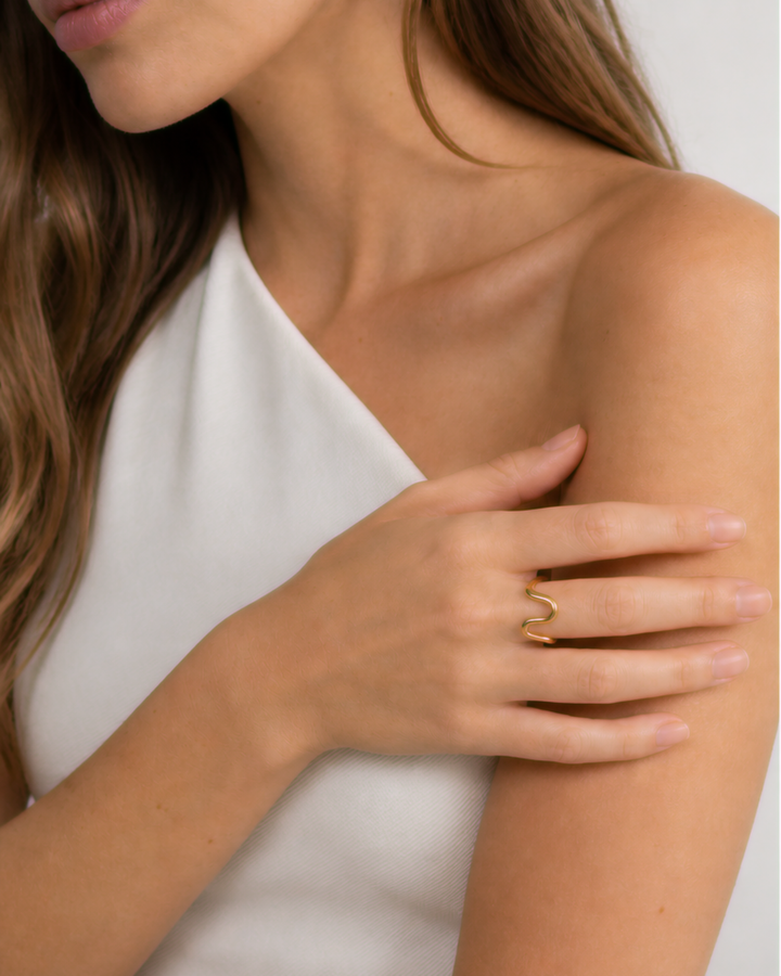 Talia Adjustable Ring — Gold — wider editorial hand view