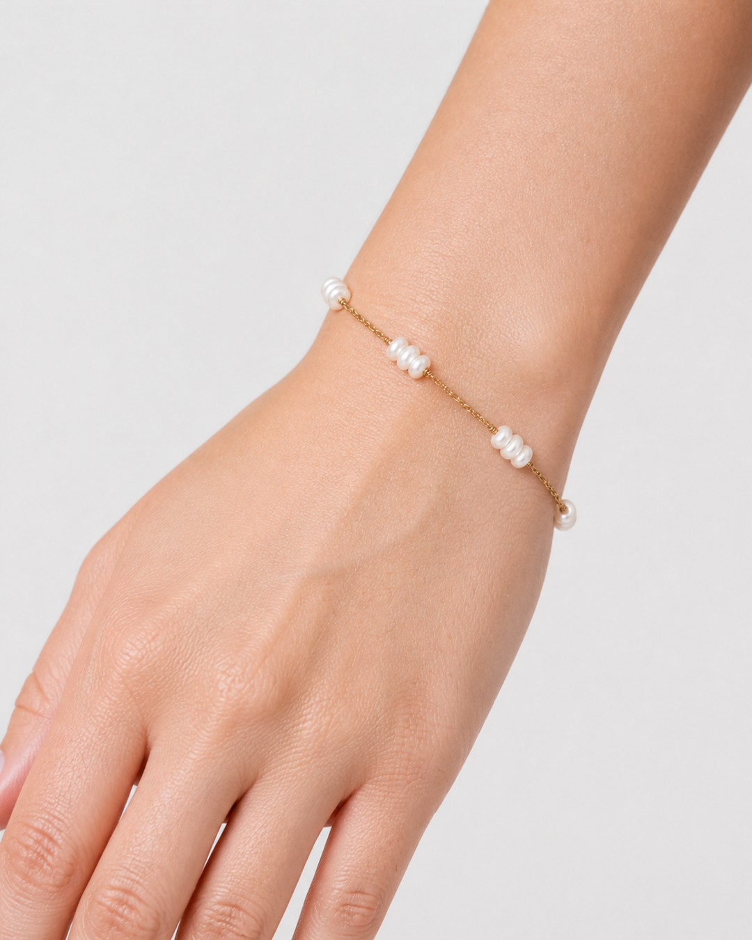 Sophia Pearl Bracelet — clean close wearing crop
