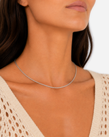 Kaia silver-tone twisted rope chain in a close oblique neckline view