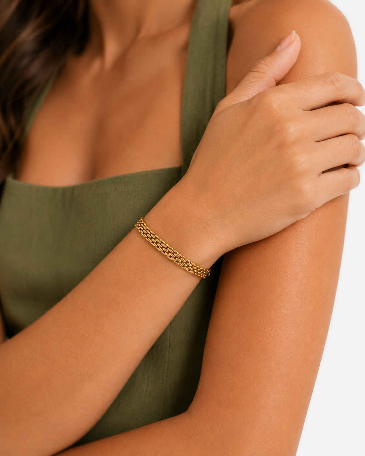Ilaria Sifnos Bracelet — 07 — Gold — powder-blue/white outfit — raised-wrist close-up