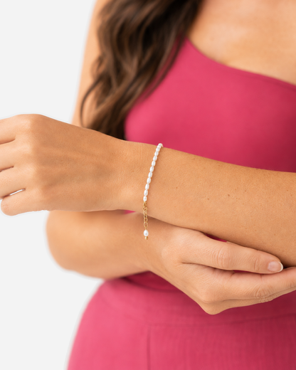 Greta Pearl Bracelet — 08 — Gold — plum square-neck — horizontal forearm
