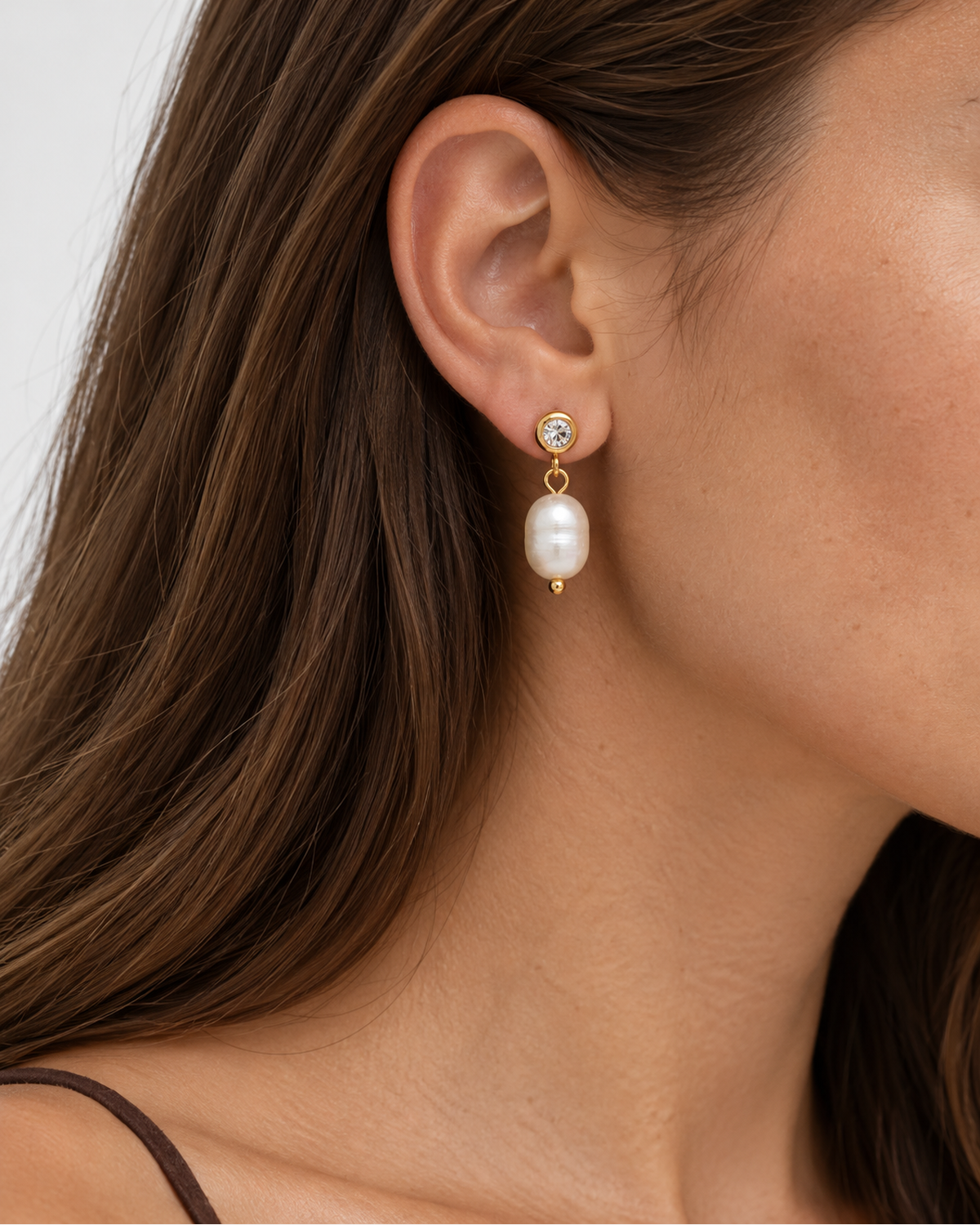 Marley Pearl Crystal Earrings — 07 — Gold — cocoa-plum tank — hand near jaw