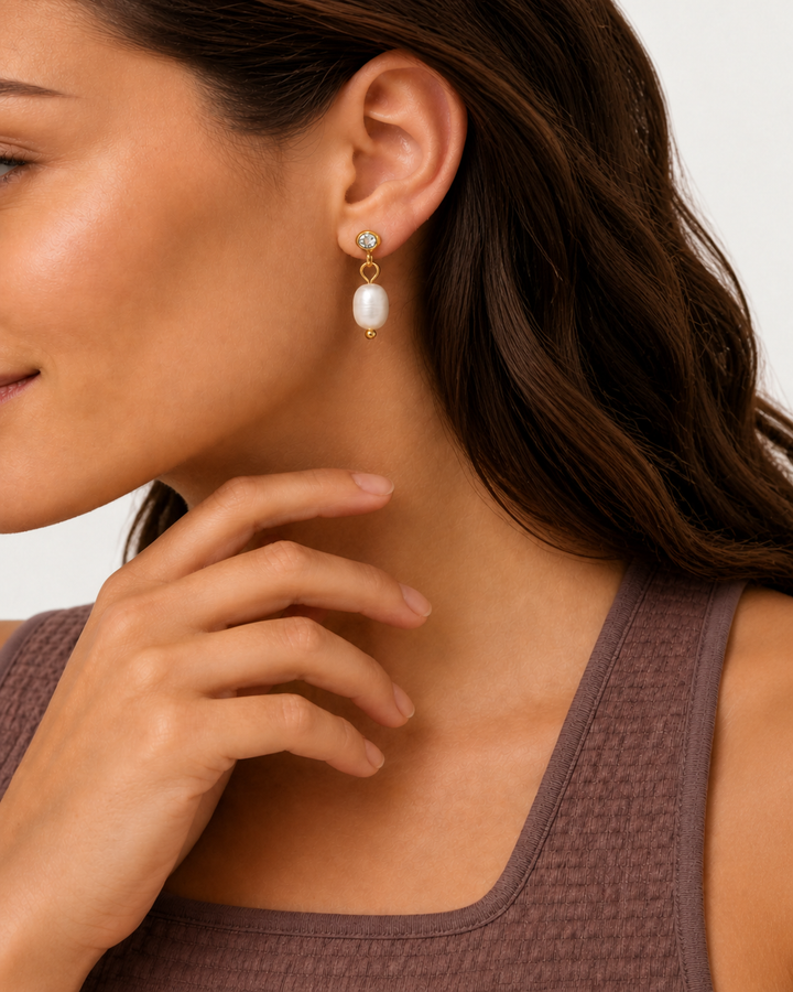 Marley Pearl Crystal Earrings — 07 — Gold — cocoa-plum tank — hand near jaw