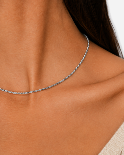 Kaia silver-tone twisted rope chain shown in a macro wearing detail at the neckline