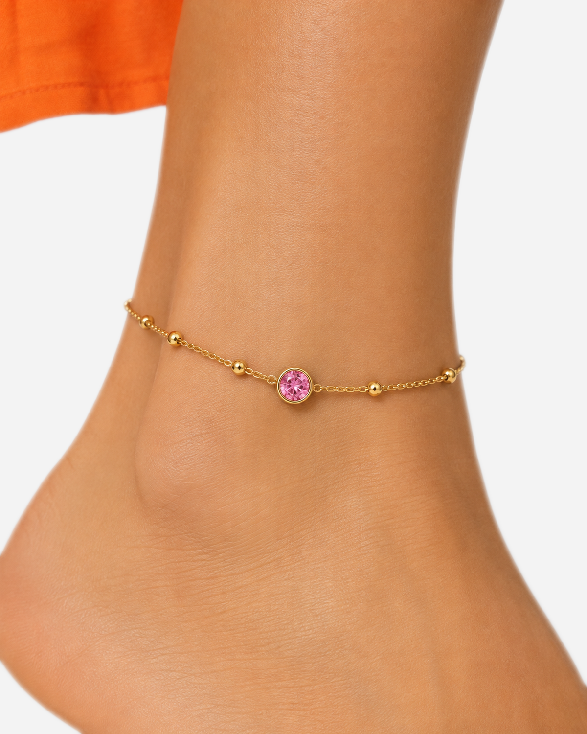 Jade Crystal Anklet — 08 — Pink crystal ankle-wearing macro with tangerine dress