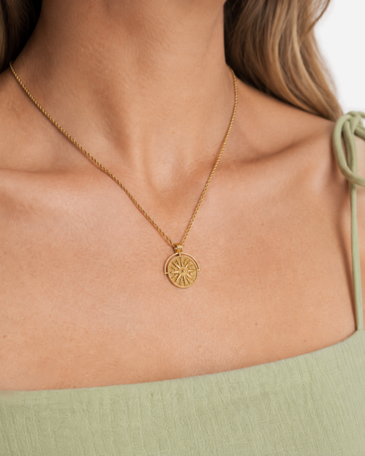 Marisol Golden Sun Necklace — 24 — Gold — shell-white open-collar resort shirt — model wide editorial