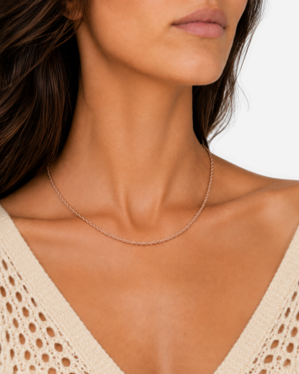 Kaia Rope Chain Necklace — 25 — Rose Gold — dark-teal/shell-pink outfit — hand-led wearing close-up