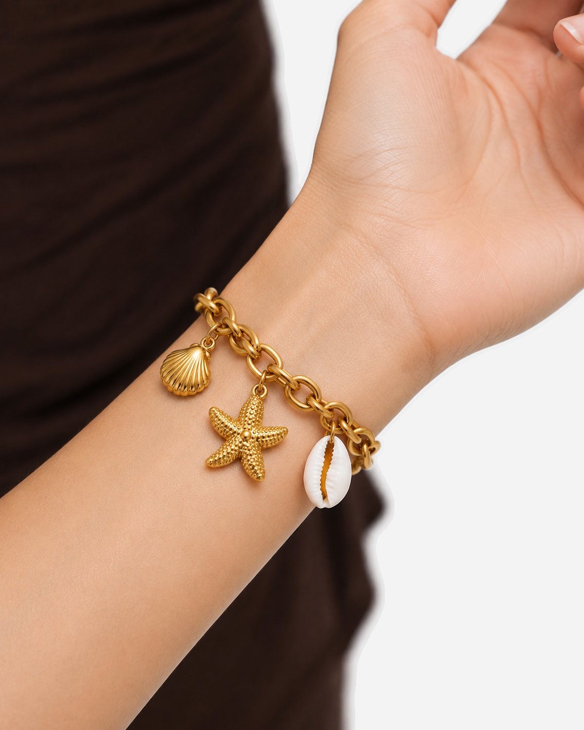 Jenna Ocean Charm Bracelet — Gold beach model view