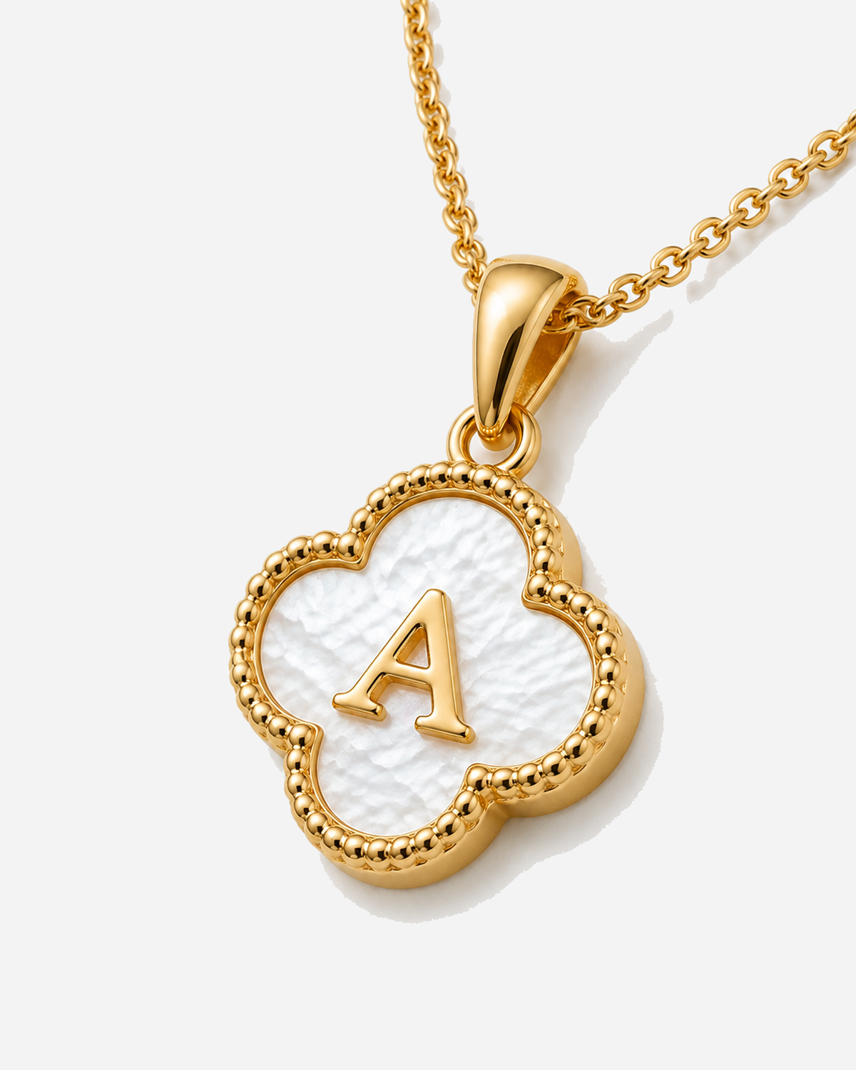 Clover Initial Necklace — 09 — oblique mother-of-pearl A pendant construction macro